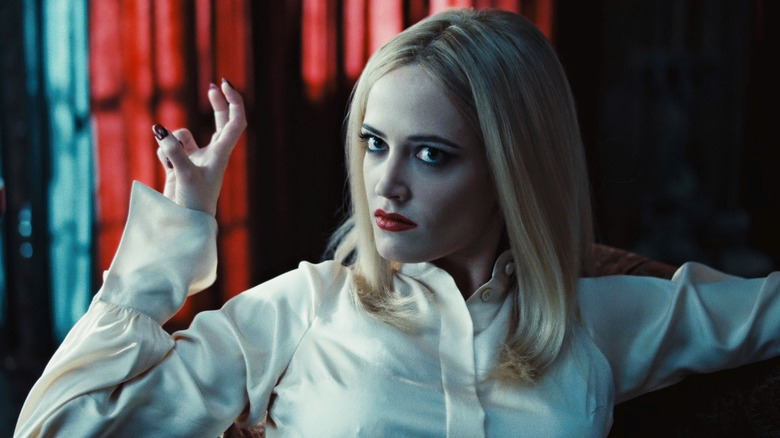 Eva Green as Angelique gesturing fiercely in Dark Shadows