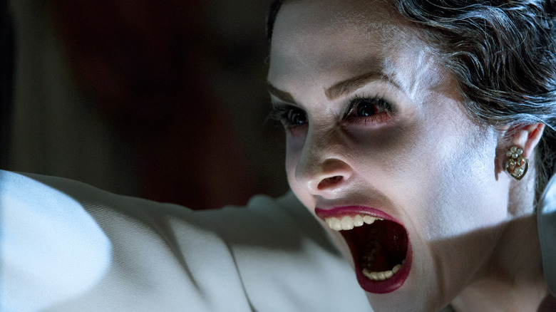 A ghost woman screaming in Insidious: Chapter 2