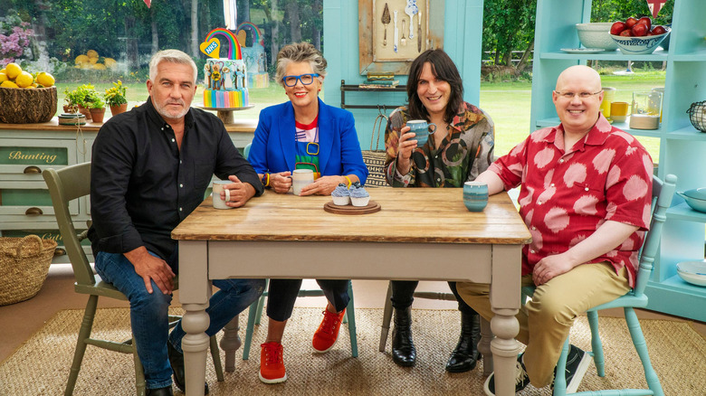 Great British Baking Show Hosts at Table