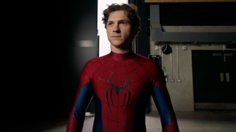 A behind-the-scenes picture of Tom Holland as Peter Parker wearing his new suit in Spider-Man: Brand New Day