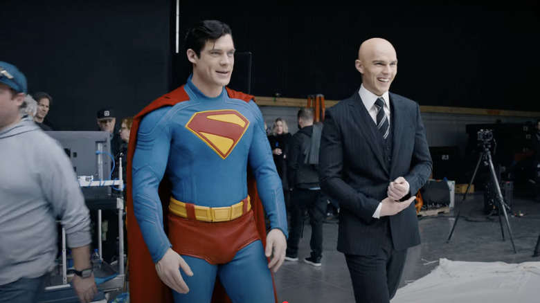 David Corenswet as Superman and Nicholas Hoult as Lex Luthor walking on the set of Superman