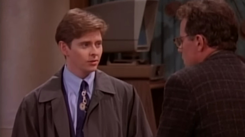 Dave (Dave Foley) talking to Bill (Phil Hartman) on NewsRadio