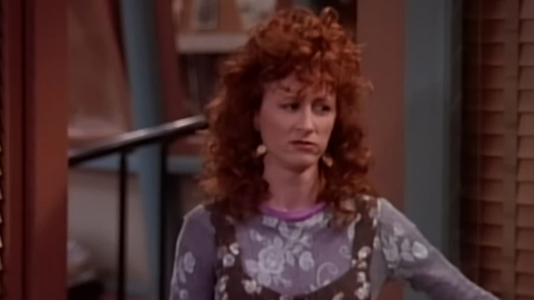 Beth (Vicki Lewis) giving a look in NewsRadio