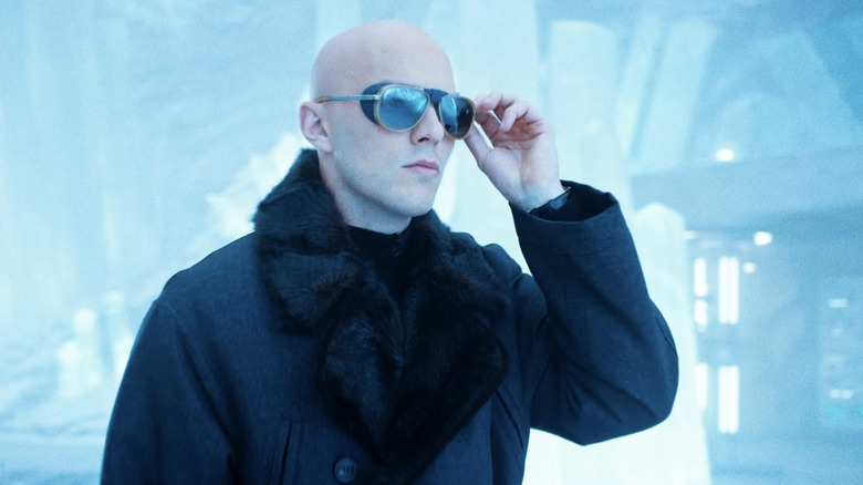 Nicholas Hoult as Lex Luthor standing in the Fortress of Solitude with sunglasses on in Superman (2025)