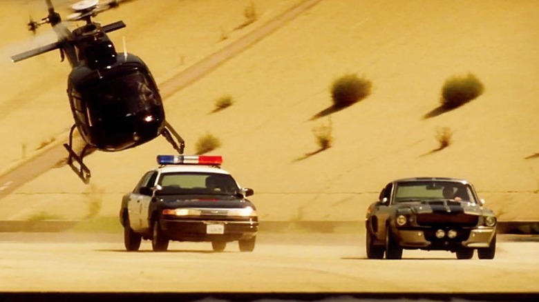 Nicolas Cage as Randall "Memphis" Raines in the finale chase of Gone in 60 Seconds