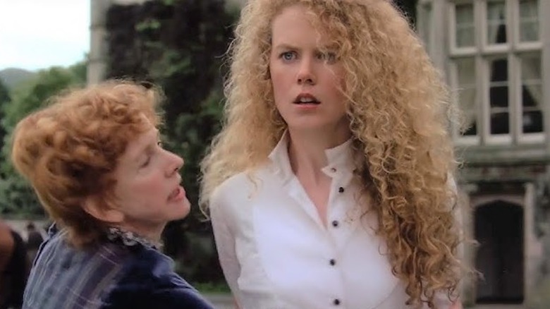 Barbara Babcock as Nora Christie restrains Nicole Kidman as Shannon Christie in Far and Away