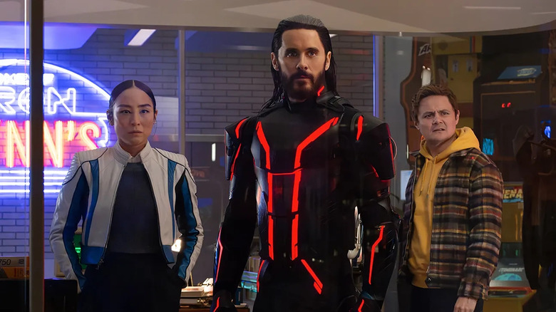 Eve Kim, Ares and Seth stood in Flynn's office in Tron: Ares