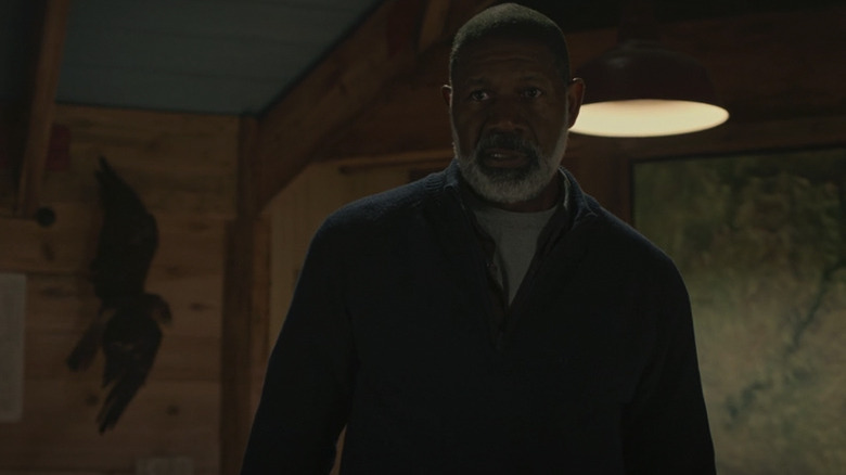 Dennis Haysbert, standing in No Exit