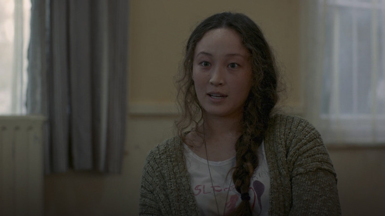 Havana Rose Liu in No Exit, attending a meeting