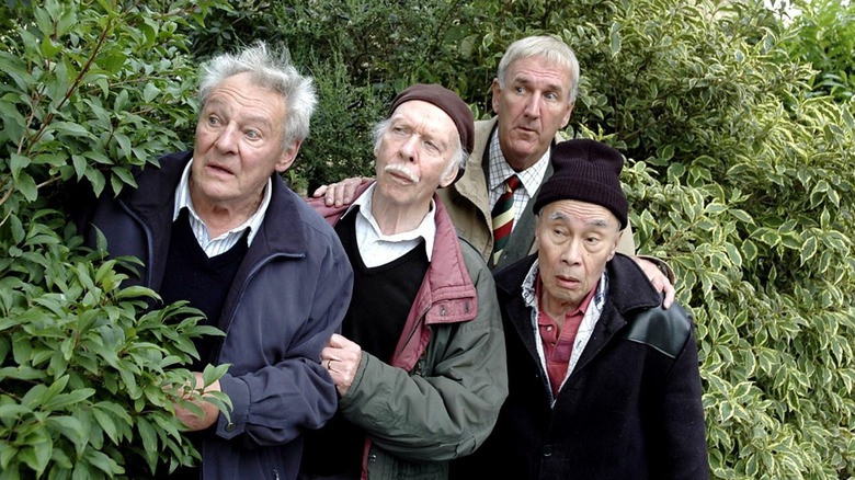 Four old codgers looking out from a bush in Last of the Summer Wine.