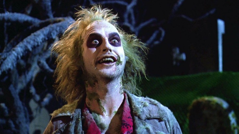 Michael Keaton as Beetlejuice looks surprised in Beetlejuice
