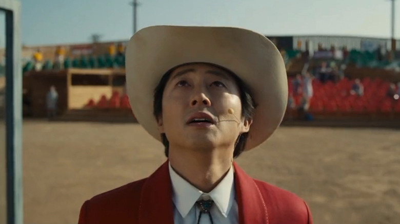 Steve Yeun with a cowboy hat in Nope