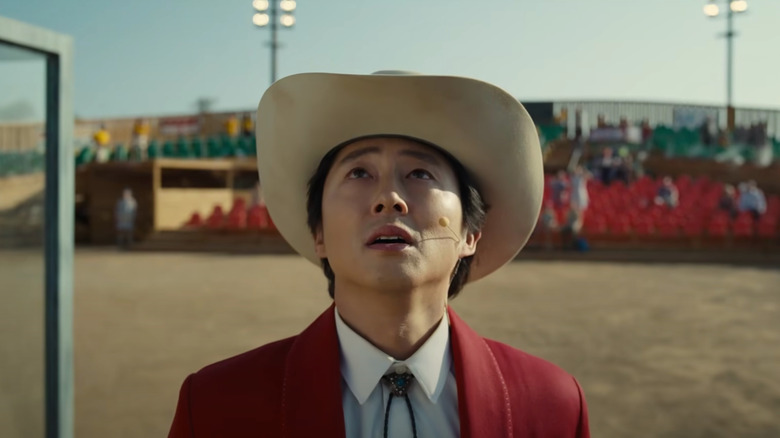 Nope steven yeun looking up