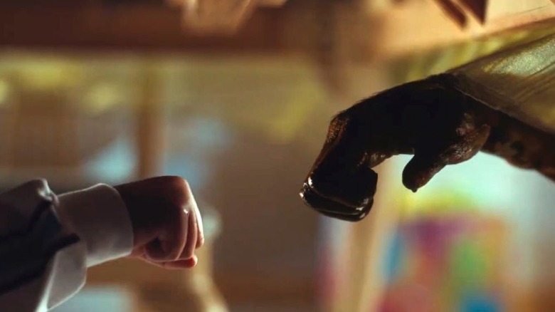Jupe and Gordy about to do their exploding fist bump in Nope