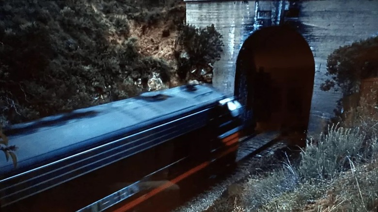 A train plunges into a tunnel at the end of North by Northwest