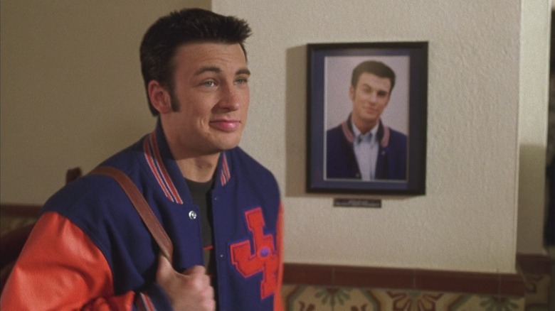 Chris Evans as Jake Wyler in Not Another Teen Movie, standing in front of his own portrait