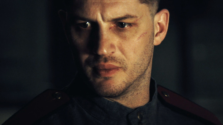 Tom Hardy's Captain Leo Demidov stares across frame in Child 44