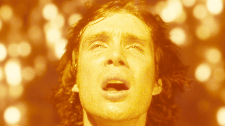 Cillian Murphy as Robert Capa bathed in the light of the sun in Sunshine