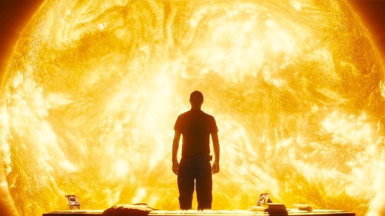 Chris Evans as James Mace staring at the sun in Sunshine