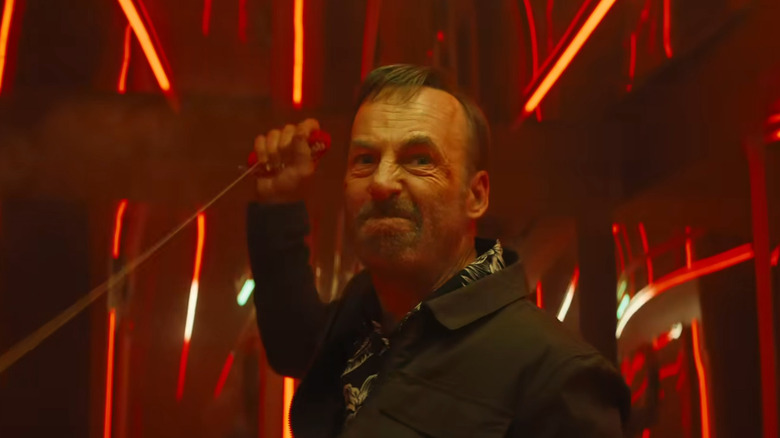 Hutch Mansell pulling a rip cord in Nobody 2