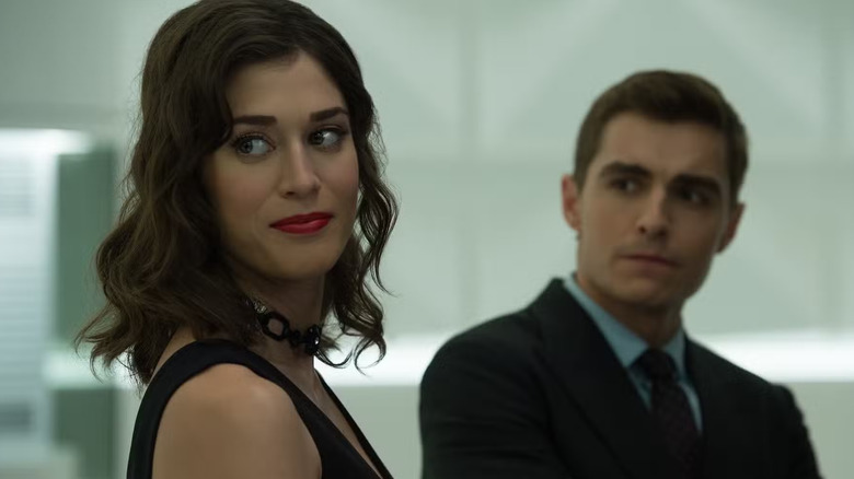 Lula looking over her shoulder and smirking with Jack behind her in Now You See Me 2