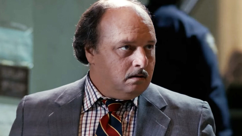 Dennis Franz's Andy Sipowicz looks to his left as he stands in his precinct in NYPD Blue