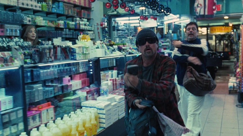 Bob and Sensei racing through the perfumery in One Battle After Another