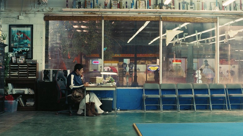 Sensei sitting at his dojo in One Battle After Another