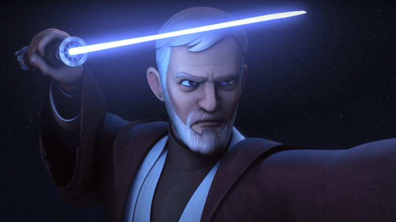 Obi-Wan holds a lightsaber