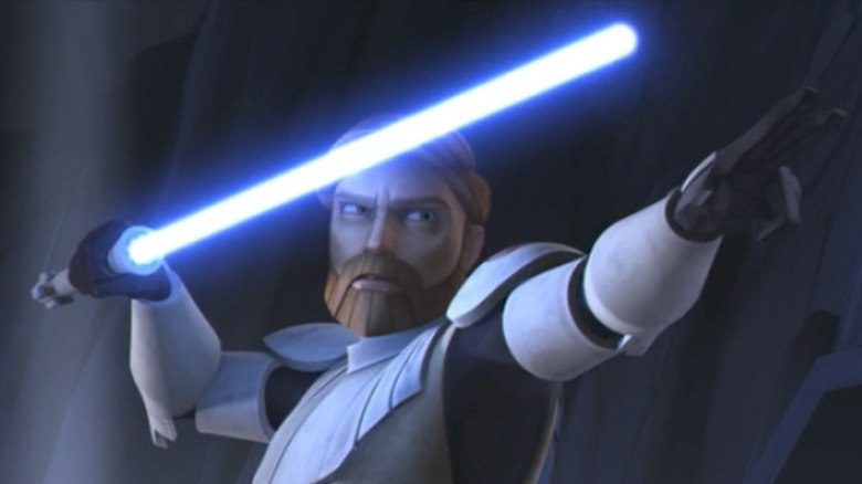 Obi-Wan Kenobi prepares for a lightsaber battle in Star Wars: The Clone Wars