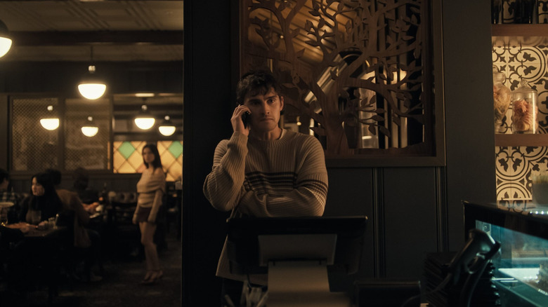 Bear on the phone with Nikki stalking him in Obsesion