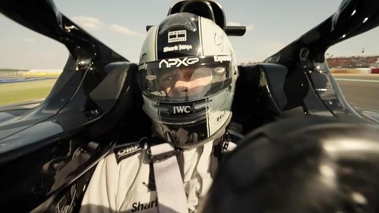 Brad Pitt as Sonny in the cockpit of his car in F1: The Movie