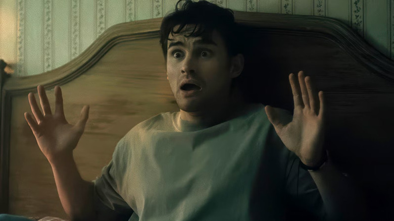 Bear looks shocked in bed in Obsession