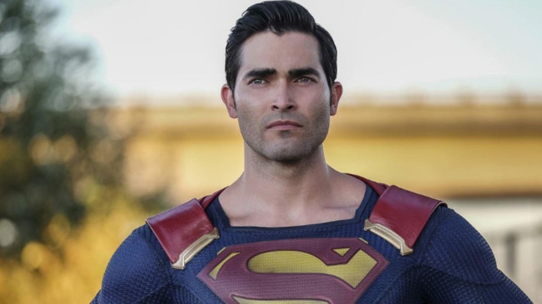 Tyler Hoechlin's Clark/Superman looks off in the distance in Superman & Lois