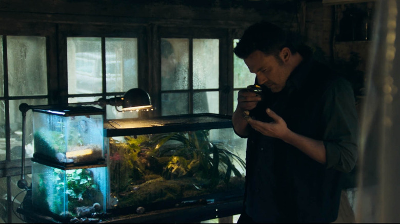 Ben Affleck getting up close and personal with some snails in Deep Water