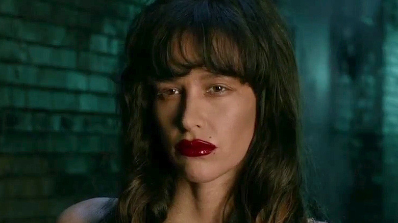 Bloody Paz de la Huerta holding scissors