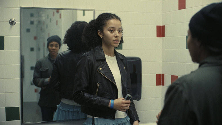 Deandra confronting Willa in a school bathroom in One Battle After Another