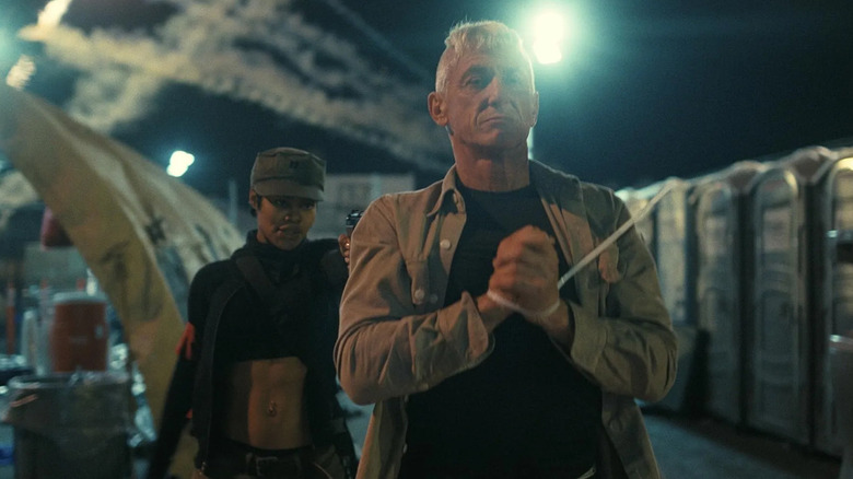 Perfidia (Teyana Taylor) apprehends Col. Lockjaw (Sean Penn) in an immigrant detention camp in One Batter After Another