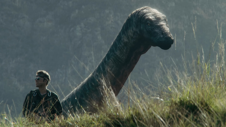 The Brachiosaurus poking its neck up over the hill in Primitive War