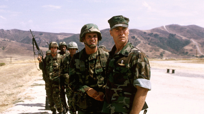 A line of soldiers in the desert, led by Tom Highway, in Heartbreak Ridge