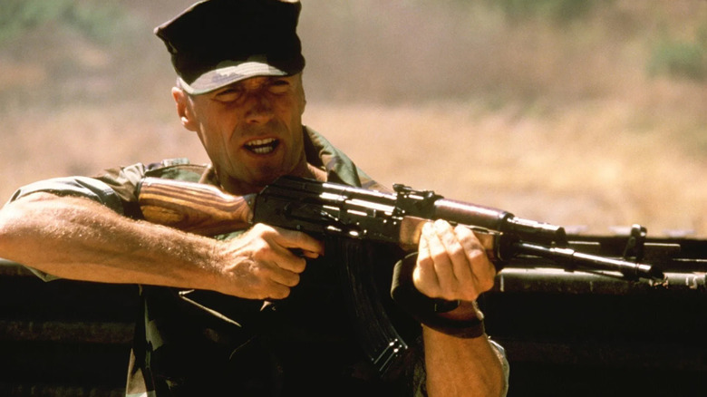 Tom Highway holding a rifle in Heartbreak Ridge