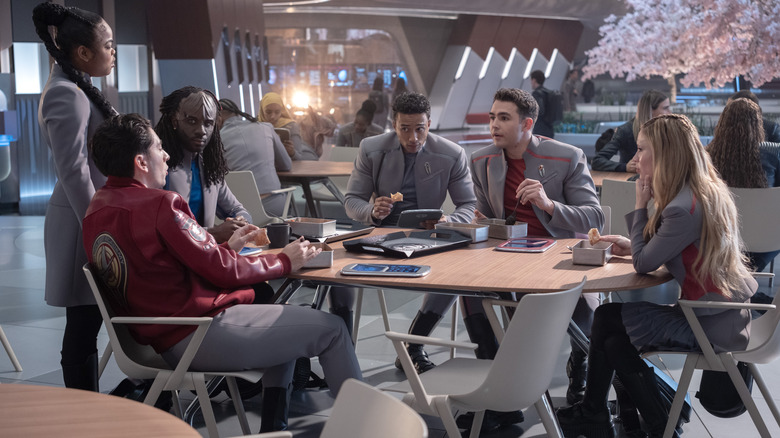 The central students all gathered aroun a lunch table in Star Trek: Starfleet Academy