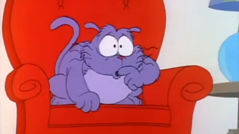 Eek! the cat on a big red chair watching TV on Eek! the Cat