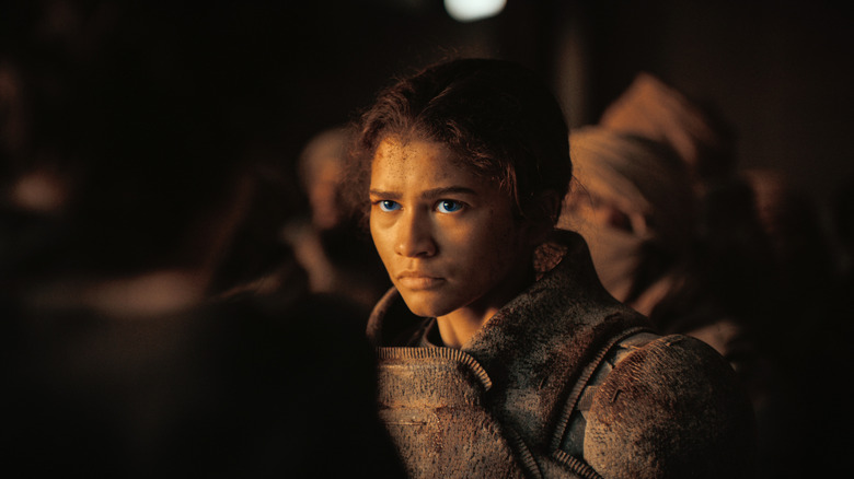 Zendaya as Chani looking with concern at Paul in Dune: Part Two