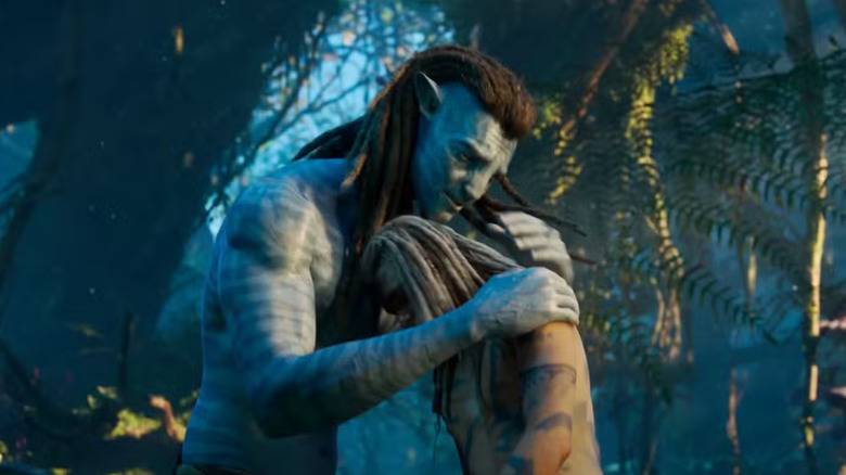 Jake and Spider embrace in Avatar: Fire and Ash