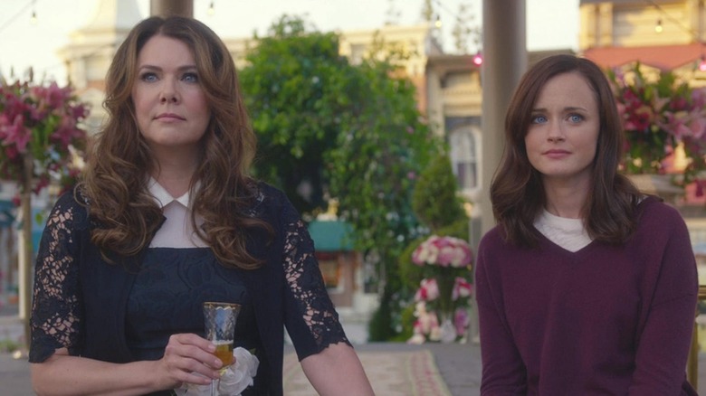 Lorelai and Rory drinking champagne in the gazebo on Gilmore Girls: A Year in the Life