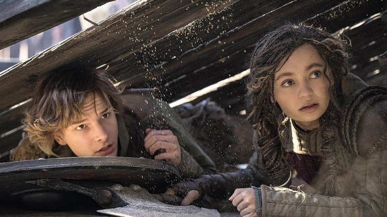 Hiccup and Astrid under wooden slides on how to train your dragon 2025