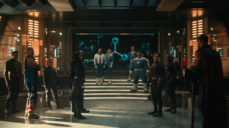 Chris Hemsworth as Thor standing in a room and addressing several other superheroes in Avengers: Doomsday