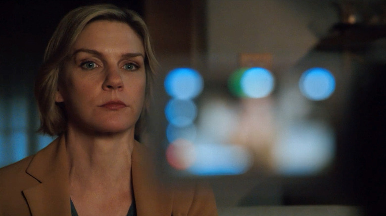 Rhea Seehorn as Carol Sturka sitting in front of a camcorder in Pluribus