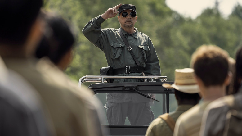The Major saluting the contestants of The Long Walk